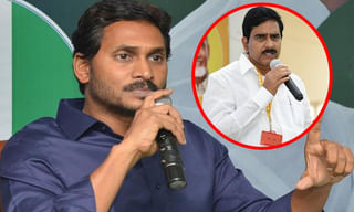 నడిరోడ్డుపై నకిలీ అధికారి దుమ్ము దులిపేసింది..