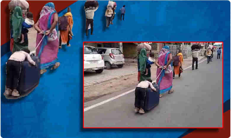 పంజాబ్  నుంచి 800 కి.మీ. కాలి నడకన.. సూట్ కేసుపైనే చిన్నారి నిద్ర