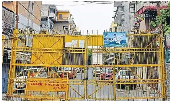 వంద రోజులుగా కంటైన్మెంట్ జోన్లో.. అయినా తగ్గని కరోనా..!