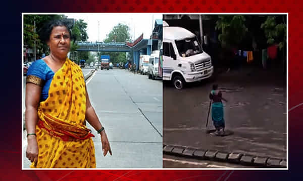 ముంబైలో మ్యాన్ హోల్ పై 7 గంటలు నిలబడిన మహిళ ఈమే !