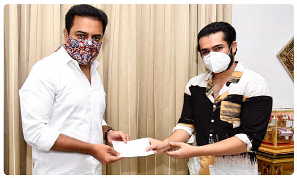కేటీఆర్ను కలిసి చెక్ అందించిన హీరో రామ్