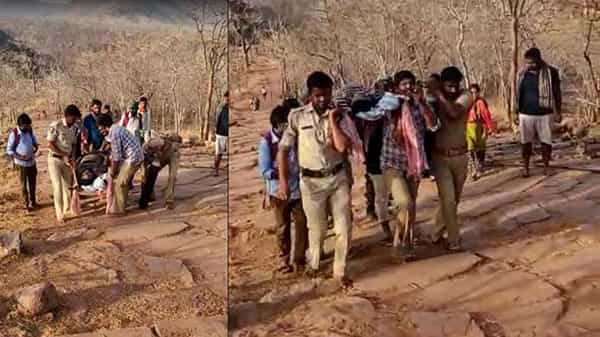 Humanity : మానవత్వం చాటుకున్న శ్రీశైలం పోలీసులు, ఆక్సిజన్ సిలిండర్ చేతపట్టి, భక్తుడ్ని భుజాలపై వేసుకుని..