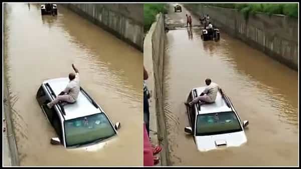 యూపీలో భారీ వర్షాలు..బాగ్ పట్ జిల్లాలో వరద నీటిలో చిక్కుకున్న కారు..డ్రైవర్ ఏం చేశాడంటే ..?