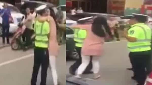 Viral Video: ట్రాఫిక్ పోలీస్కి లంచం.. నడిరోడ్డుపై ముద్దుపెట్టిన యువతి.. ఆ తరువాత ఏం జరిగిందంటే..