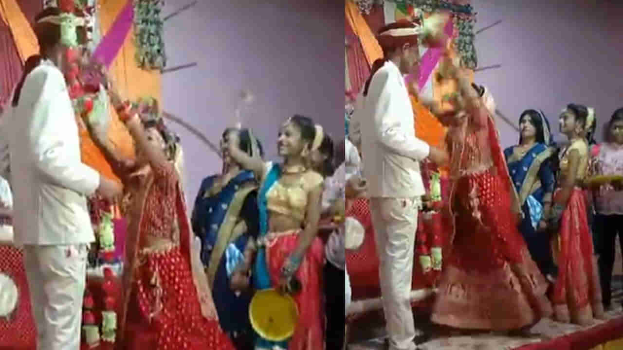 Viral Video: పెళ్లివేడుకలో ఫన్నీ సీన్.. వరుడి మెడలో మాల వేసేందుకు వధువు తంటాలు..