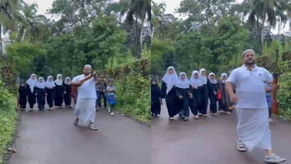 Viral Video: ద్యావుడా.. పిల్లలను స్కూల్ని తీసుకెళ్లేందుకు తుపాకి పట్టిన తండ్రి.. కారణం తెలిస్తే షాక్ అవ్వాల్సిందే