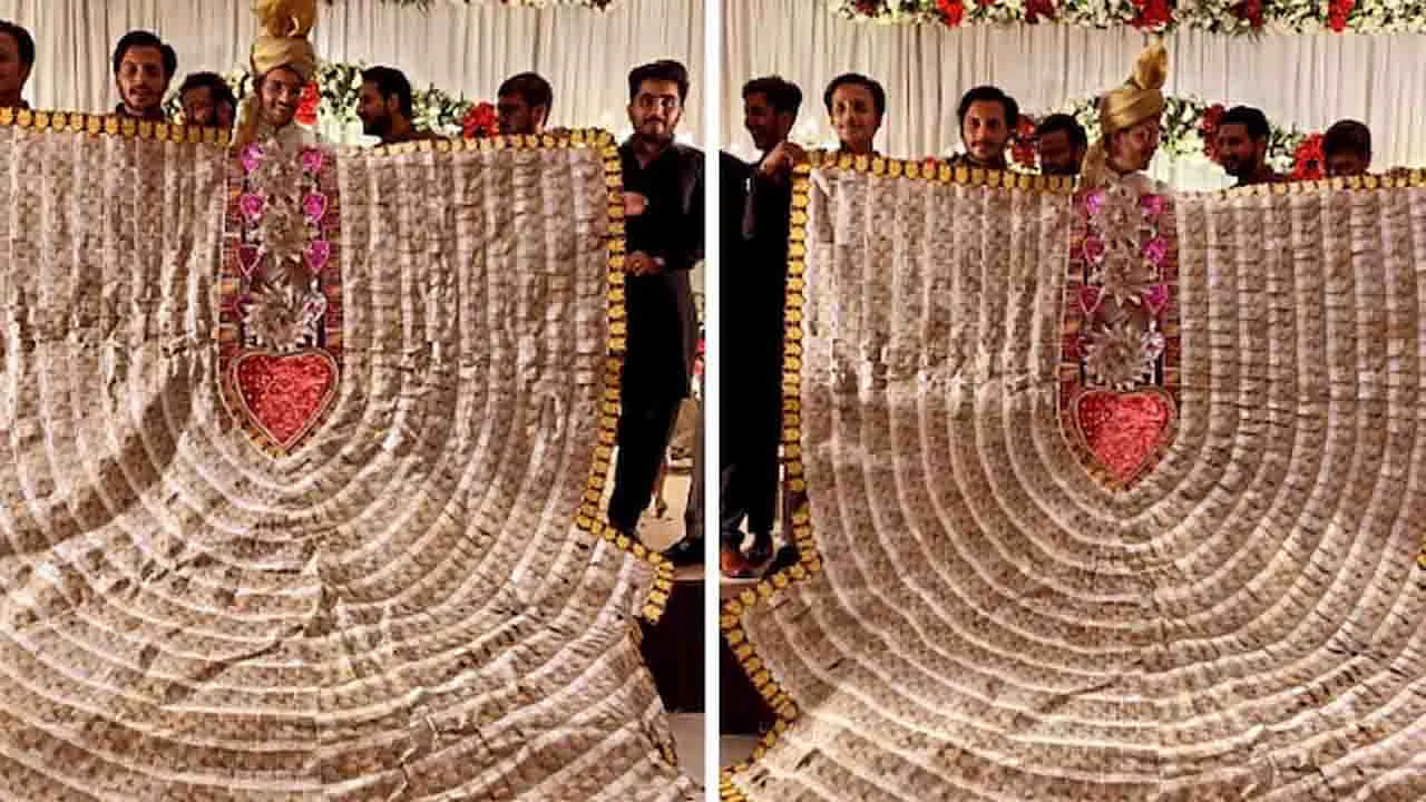 Wedding Video: ఈ వెడ్డింగ్ మరీ కాస్ట్ లీ గురూ.. కరెన్సీ నోట్లతో నేలను తాకేలా నగదు మాల.. ఎక్కడో తెలుసా?