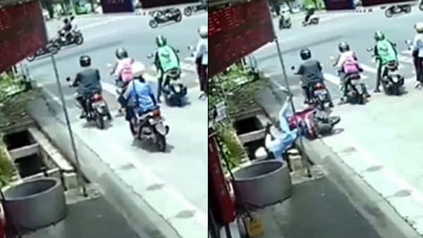 Scooty Driving Video: ట్రాఫిక్ సిగ్నల్ వద్ద స్కూటీని ఆపడానికి ట్రై చేసి.. డ్రైన్ లో తలకిందులుగా పడిన యువతి.. ఫన్నీ వీడియో వైరల్