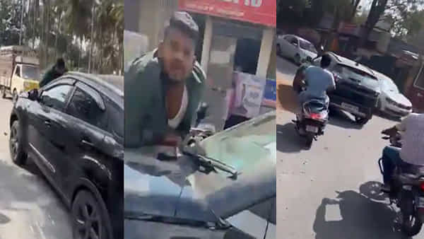 Viral Video: కారు బానెట్పై యువకుడిని ఈడ్చుకెళ్లిన మహిళ.. అందరూ కేకలు వేస్తున్నా ఆగని వైనం