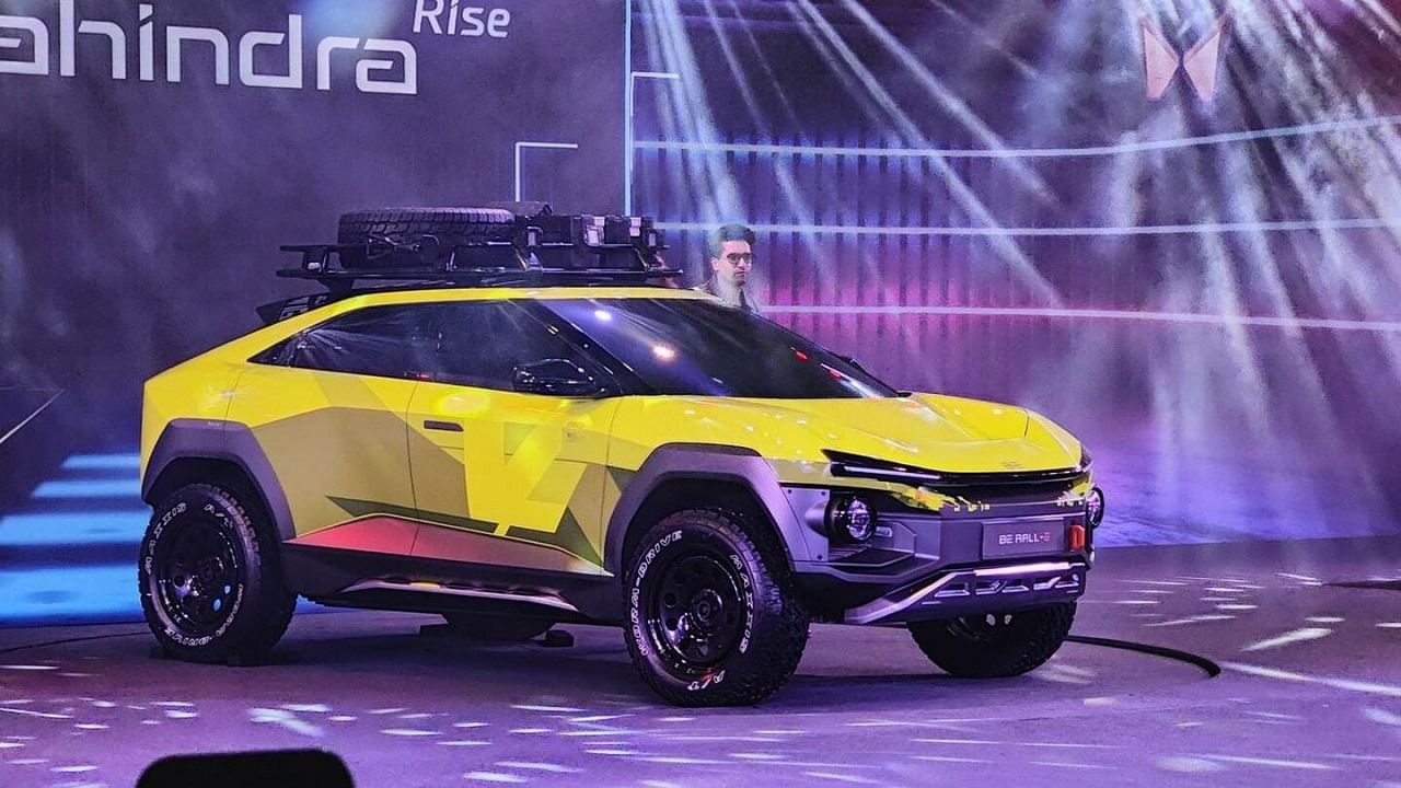 Mahindra BE Ral E is a coupe style SUV.  There are steel wheels and a roof rack to store items.  Its powertrain features rear wheel drive, dual motor on wheel drive (ADWD).  175 kW of fast charging capacity.  The battery in it gives a range of 450 kilometers on a single charge.  It is likely to hit the market by December 2025. 