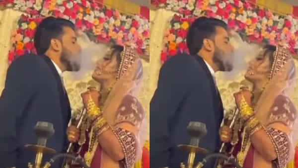 Watch Viral Video: ఇదేం పైత్యం తల్లీ నీకు...! పెళ్లి మండపంపైనే రెచ్చిపోయిన వధువు.. పొగ తాగుతూ వరుడికి లిప్కిస్..