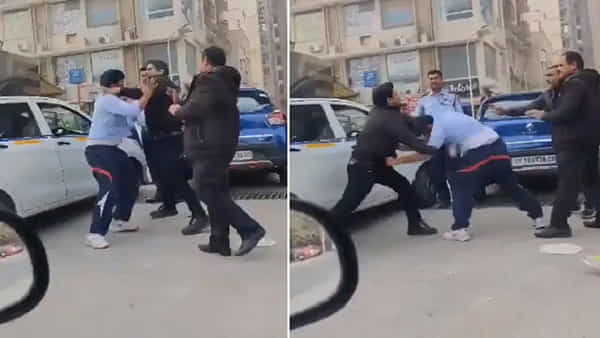 Viral Video: ప్రయాణీకుడి కోసం పొట్టుపొట్టున కొట్టుకున్న క్యాబ్ డ్రైవర్స్.. WWE పోరాటంలా కనిపిస్తుందంటున్న నెటిజన్లు