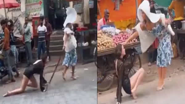 ఇదేక్కడి దారుణం..! అమ్మాయి మెడలో బెల్టు కట్టి.. కుక్కలా వీధుల్లో తిప్పుతున్న మహిళ.. నేరం ఏంటో మరీ..?