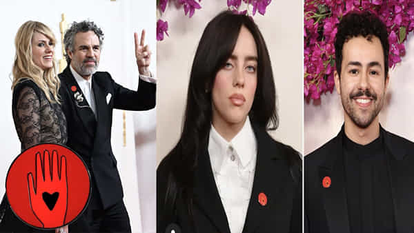 Oscars 2024: ఆస్కార్ వేదికపై రెడ్ పిన్లతో కనిపించిన హాలీవుడ్ అగ్రనటులు..! దీని అర్ధం ఏంటో తెలుసా..