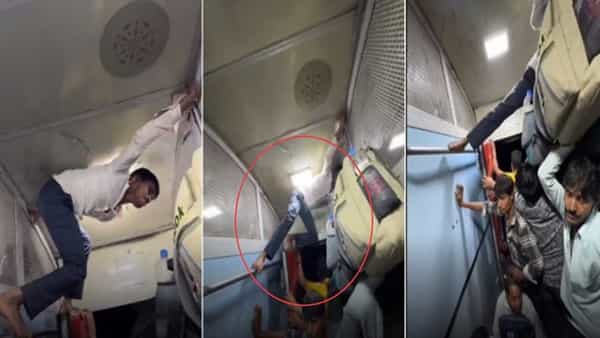 Viral Video: అయ్యో పాపం.. రైలులో టాయిలెట్కు వెళ్లేందుకు ఇతగాడి పాట్లు చూడండి! ఏకంగా స్పైడర్మ్యాన్ స్టంట్..