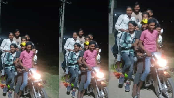 ఓ మై గాడ్.. బైక్పై ఏకంగా పది మంది యువకుల ప్రయాణం.. కాస్త తేడా వస్తే అంతే..