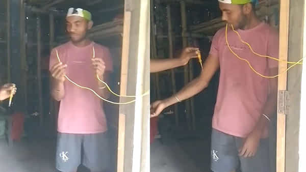 Viral Video: విద్యుత్ వైర్లతో మృత్యువుతో ఆటడుతున్న యువకుడు.. షాకింగ్ వీడియో వైరల్..