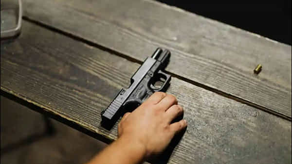 Gun in School Bag: స్కూల్కి గన్ తీసుకొచ్చి.. మరో విద్యార్ధిపై కాల్పులు జరిపిన నర్సరీ స్టూడెంట్! గోడదూకి పరార్