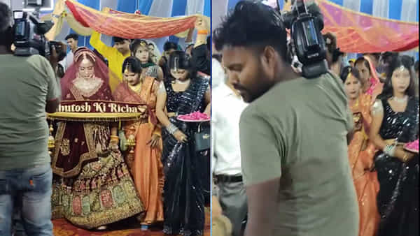 Viral Video: పెళ్లి కుమార్తెను వీడియో తీసి షాక్ అయిన కెమెరామెన్... పెళ్లి వేడుకలో నవ్వులే నవ్వులు