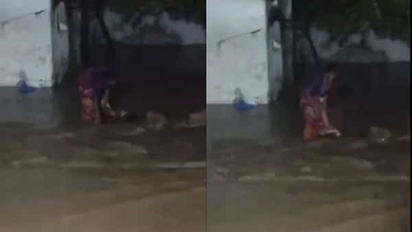 Viral Video: వరద నీటిలో కొడుకు కొనప్రాణం... ఒడ్డుకు లాక్కొచ్చి చూసిన కన్నతల్లికి షాక్
