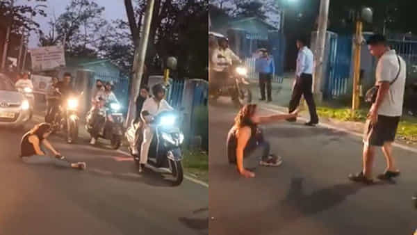 Viral Video: వామ్మో.. రోడ్డు మీద ఏందా రచ్చ.. ఎంతేశావు తల్లో... మద్యం మత్తులో మహిళ రచ్చ రచ్చ...