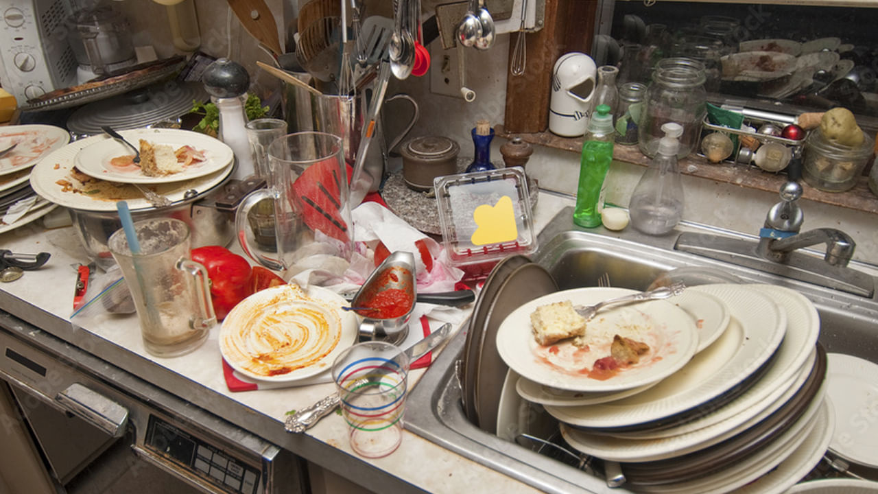 Unwashed Dishes In Kitchen