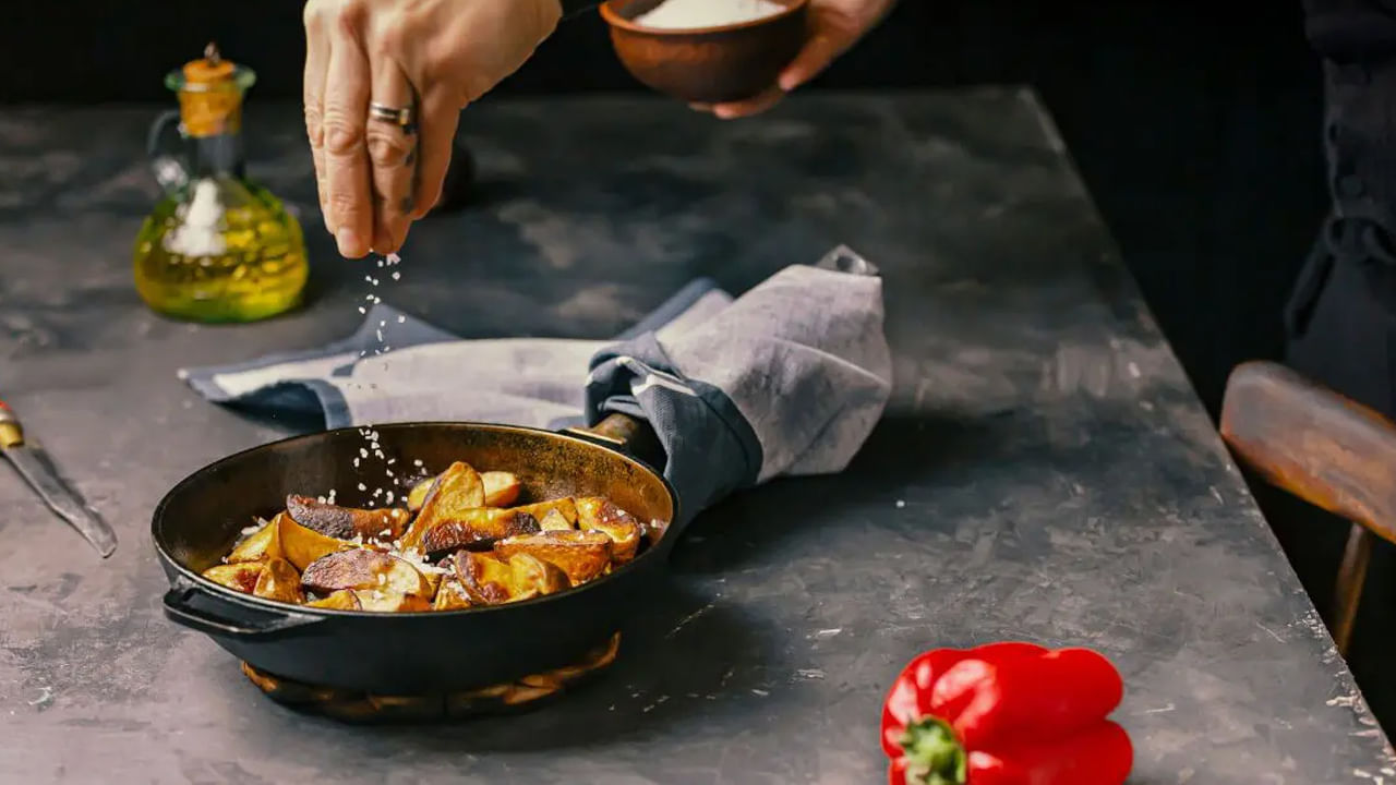 Sprinkling Salt On Food