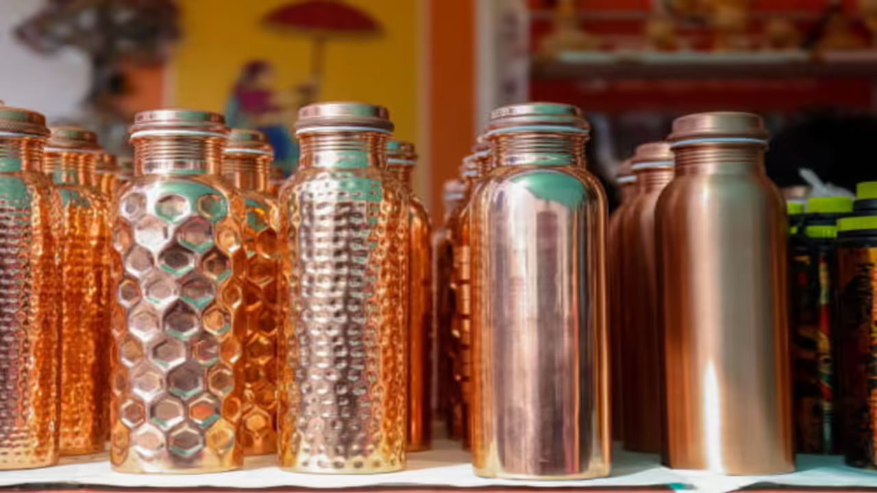 Copper Bottles On Table