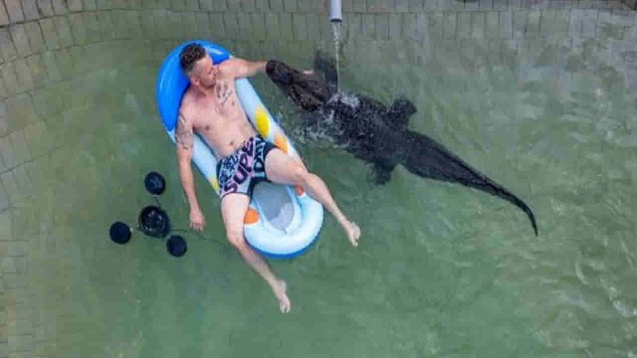 Viral Video: భారీ మొసలితో కలిసి ఓ మనిసి ఈత కొట్టడం చూశారా..? వైరల్ వీడియోతో నెటిజన్స్ షాక్!