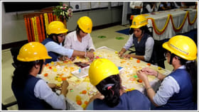 టాటా మోటార్స్ మహిళా ఉద్యోగులు ట్రక్ డ్రైవర్లకు రాఖీలు