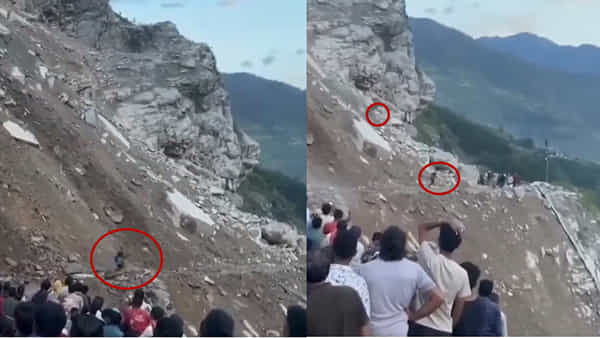 Watch Video: కొండచరియలు విరిగిపడుతుండగా రోడ్డు దాటే ప్రయత్నం.. సడెన్గా దూసుకొచ్చిన బండరాయి.. కట్చేస్తే..