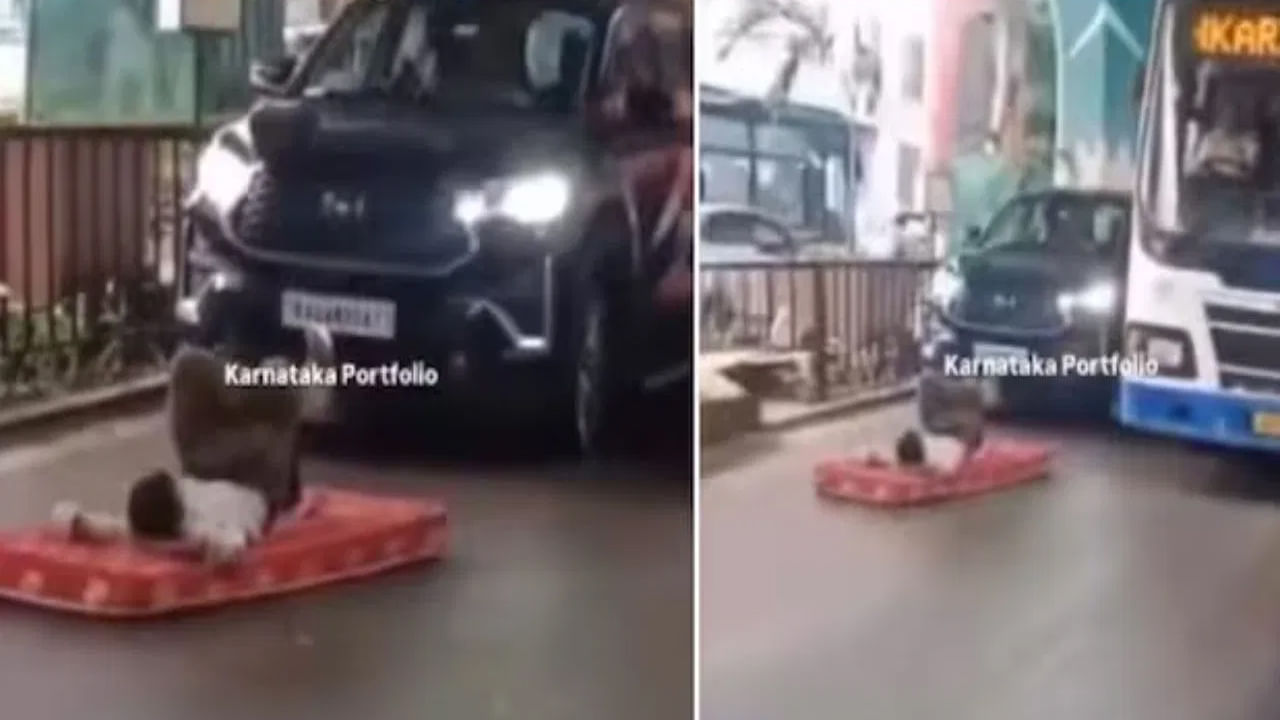 పిచ్చి పీక్ స్టేజ్ లో బిజీ రోడ్డు మధ్యలో పరుపుమీద నిద్రపోతున్న వ్యక్తి.. నెట్టింట్లో వీడియో సంచలనం