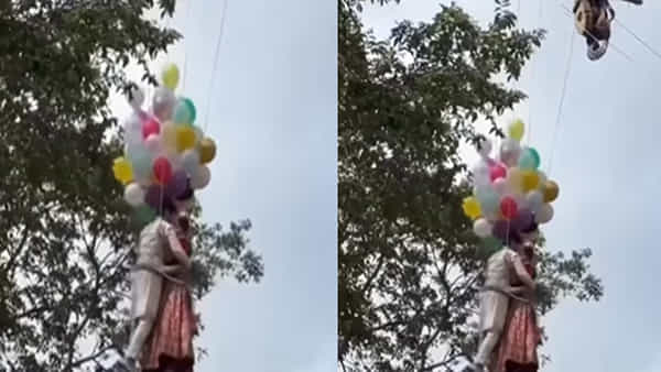 Viral Video: గాలిలో వేలాడుతూ ఓ జంట ప్రీ వెడ్డింగ్ షూట్.. పెళ్ళికి ముందే రిస్క్ అంత అవసరమా అంటూ నెటిజన్లు కామెంట్స్