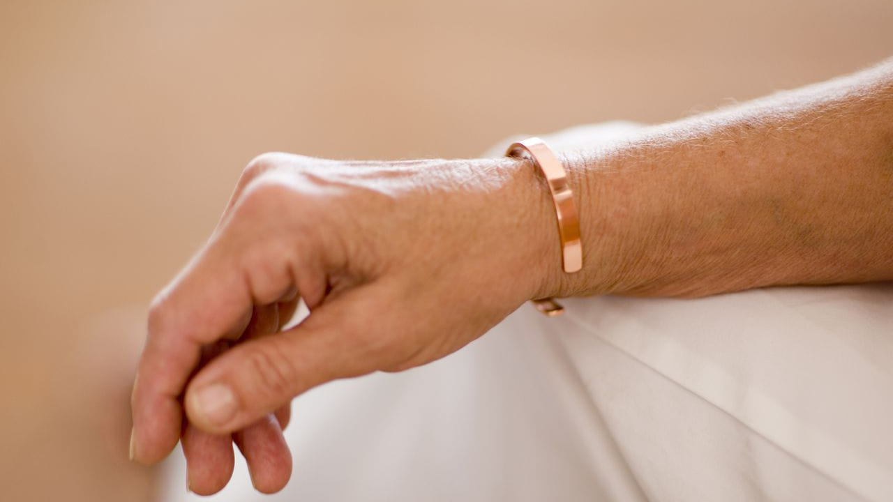 Copper Bracelet On Hand