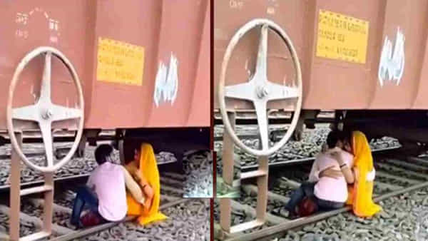 Watch: గూడ్స్ రైలు కింద రెచ్చిపోయిన ప్రేమ జంట..కట్చేస్తే..దిమ్మతిరిగి బొమ్మ కనిపించింది..!
