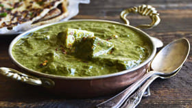 పాలక్ పన్నీర్‌ రగడ.. ఇద్దరు భారతీయ విద్యార్ధులకు రూ.1.65 కోట్ల లా