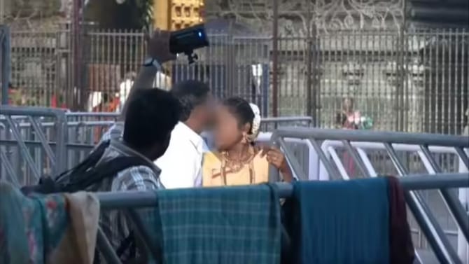 శ్రీవారి సన్నిధిలో ఫోటో షూట్.. క్షమాపణ చెప్పిన కొత్తజంట