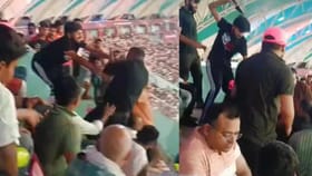 స్టేడియంలో చెప్పుల వర్షం.. అభిమానుల మధ్య ముష్టియుద్ధం