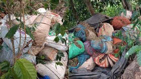 కాఫీ తోటలో మూటలు.. తెరిచి చూస్తే కథ వేరే..