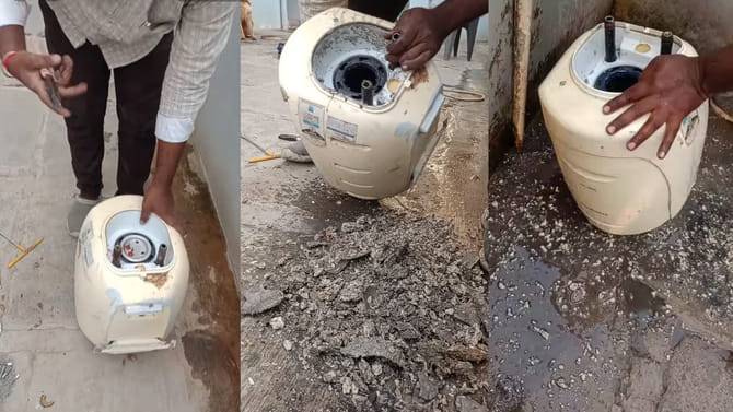 గీజర్ నుంచి నీళ్లు సరిగా రావడం లేదని ఓపెన్ చేసి చూడగా..