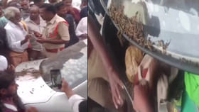 పోలీసుల కారు బీభత్సం.. డిక్కీలో గంజాయి, మద్యం బాటిళ్లు..