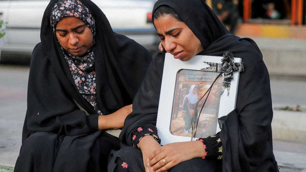 A Mother Grieves For Her Child At A School In Iran