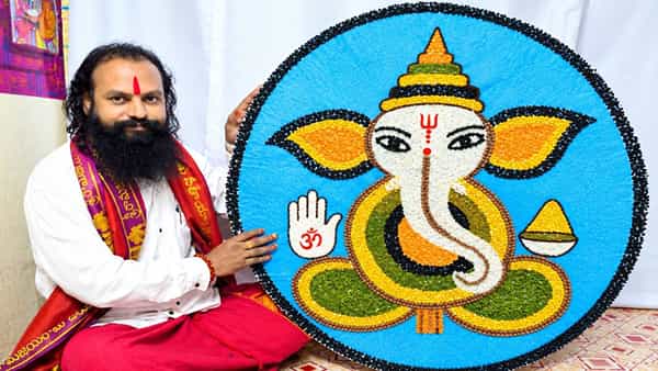 Telangana: ధాన్య లక్ష్మి ఒడిలో లంబోదరుడు.. రామకోటి రామరాజు వినూత్న కళారూపం