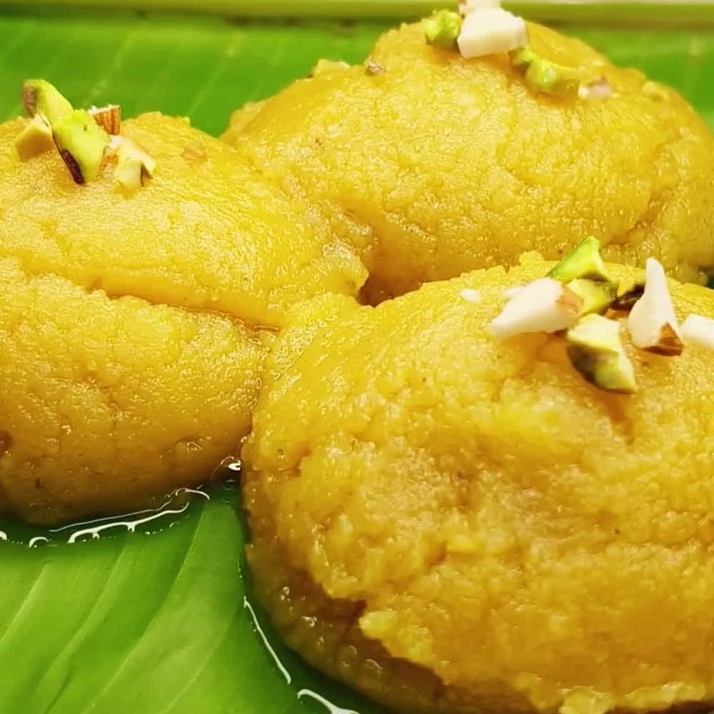 తయారీ విధానం: మిక్సీ జార్‌లో పావు కప్పు నానబెట్టిన జీడిపప్పు, 1 కప్పు పచ్చి పాలు, 3-4 యాలకులు వేయాలి. వీటిని మెత్తని నునుపైన పేస్ట్‌లా గ్రైండ్ చేసి పక్కన పెట్టుకోవాలి. ఒక గిన్నెలో 1 కప్పు శనగపిండి తీసుకోవాలి. ఇందులో అర కప్పు నెయ్యిలో నుండి పావు కప్పు కరిగించిన నెయ్యిని వేసి ఉండలు లేకుండా చిక్కటి పేస్ట్‌లా బాగా కలపాలి.